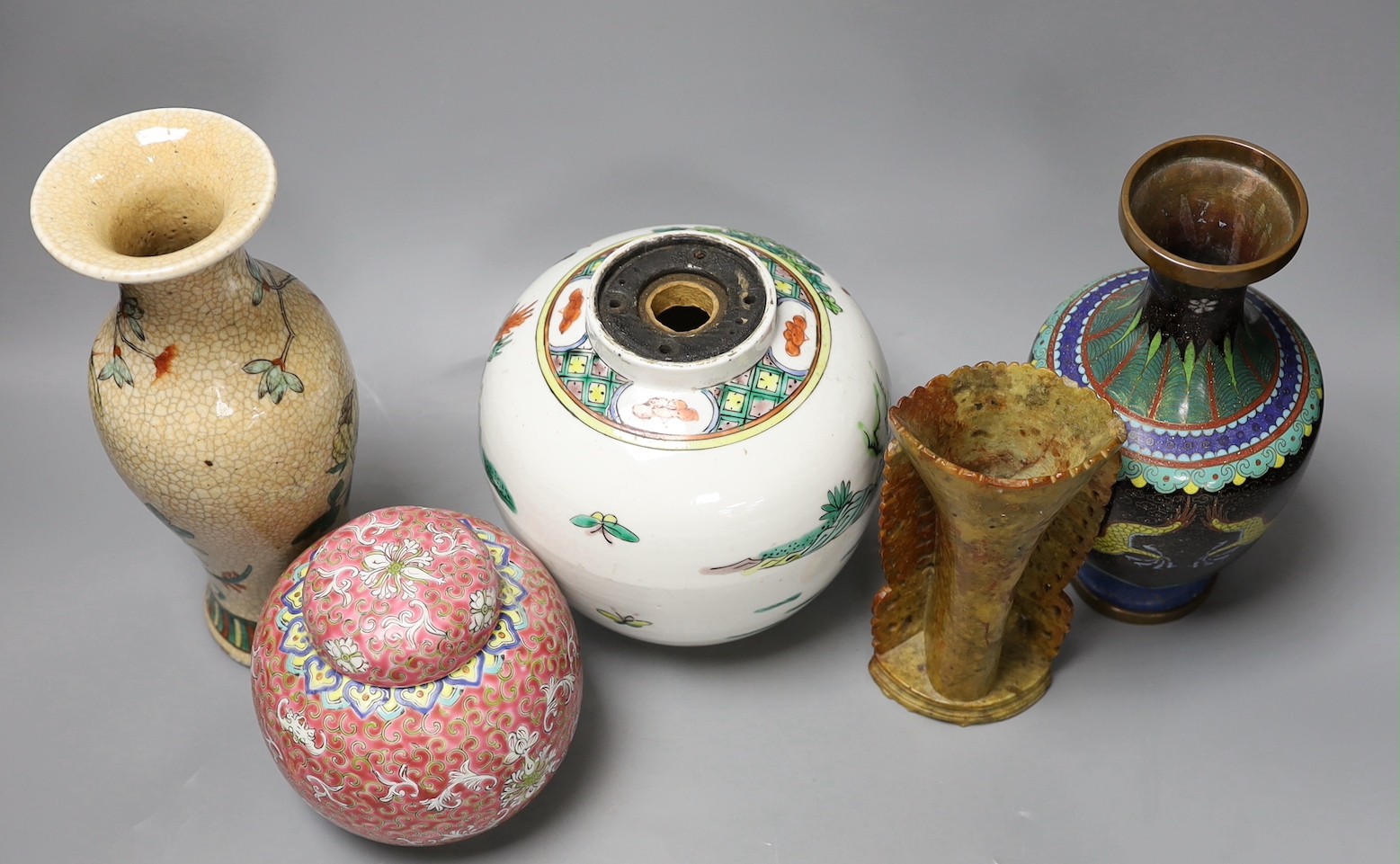 A Chinese famille verte crackle glaze vase, 25 cm high, a famille verte jar, a cloisonné enamel dragon vase, a soapstone vase and an enamelled jar and cover (5)